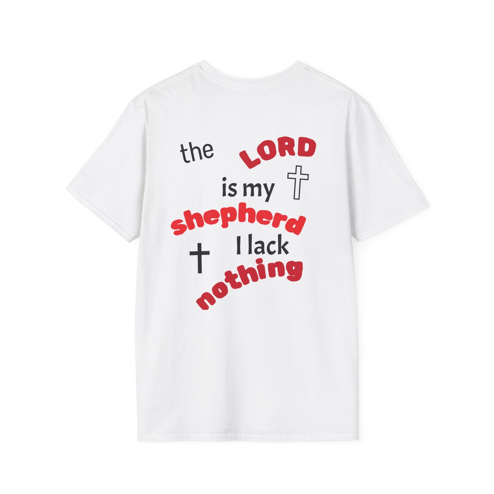 A white short-sleeve t-shirt with a humorous Christian-themed graphic on the front. The text reads 'the LORD is my shepherd I lack nothing' in black and red lettering, with black and white crosses.